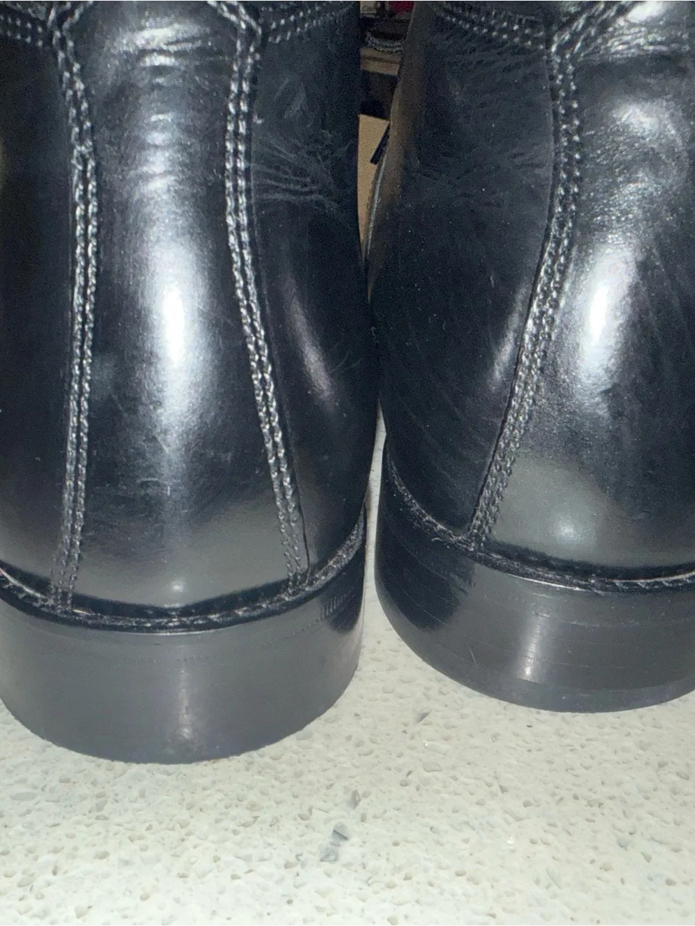 Johnston & Murphy Black Leather Chukka Boots with Tan Lining